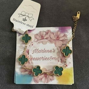 Stainless steel gold tone green four leaf clover bracelet